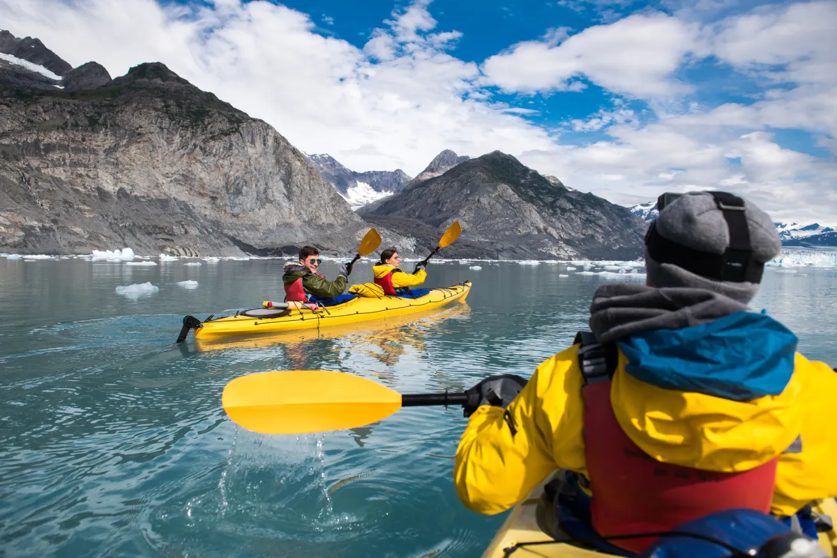 friends enjoy ocean kayaking