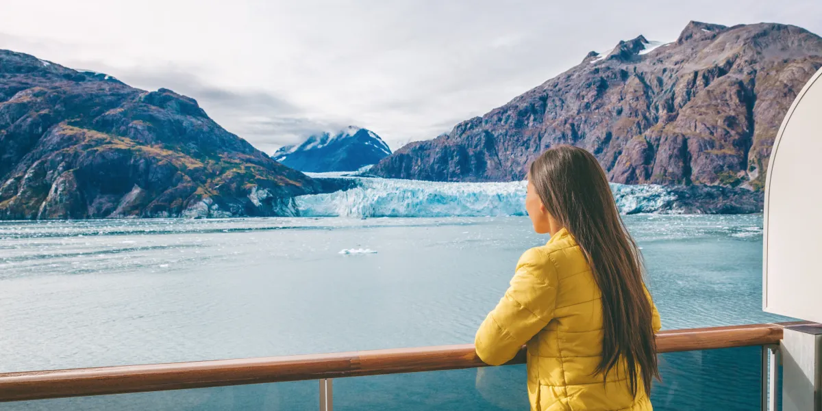 tourist looking at icebergs