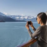 Alaska cruise ship passenger photographing